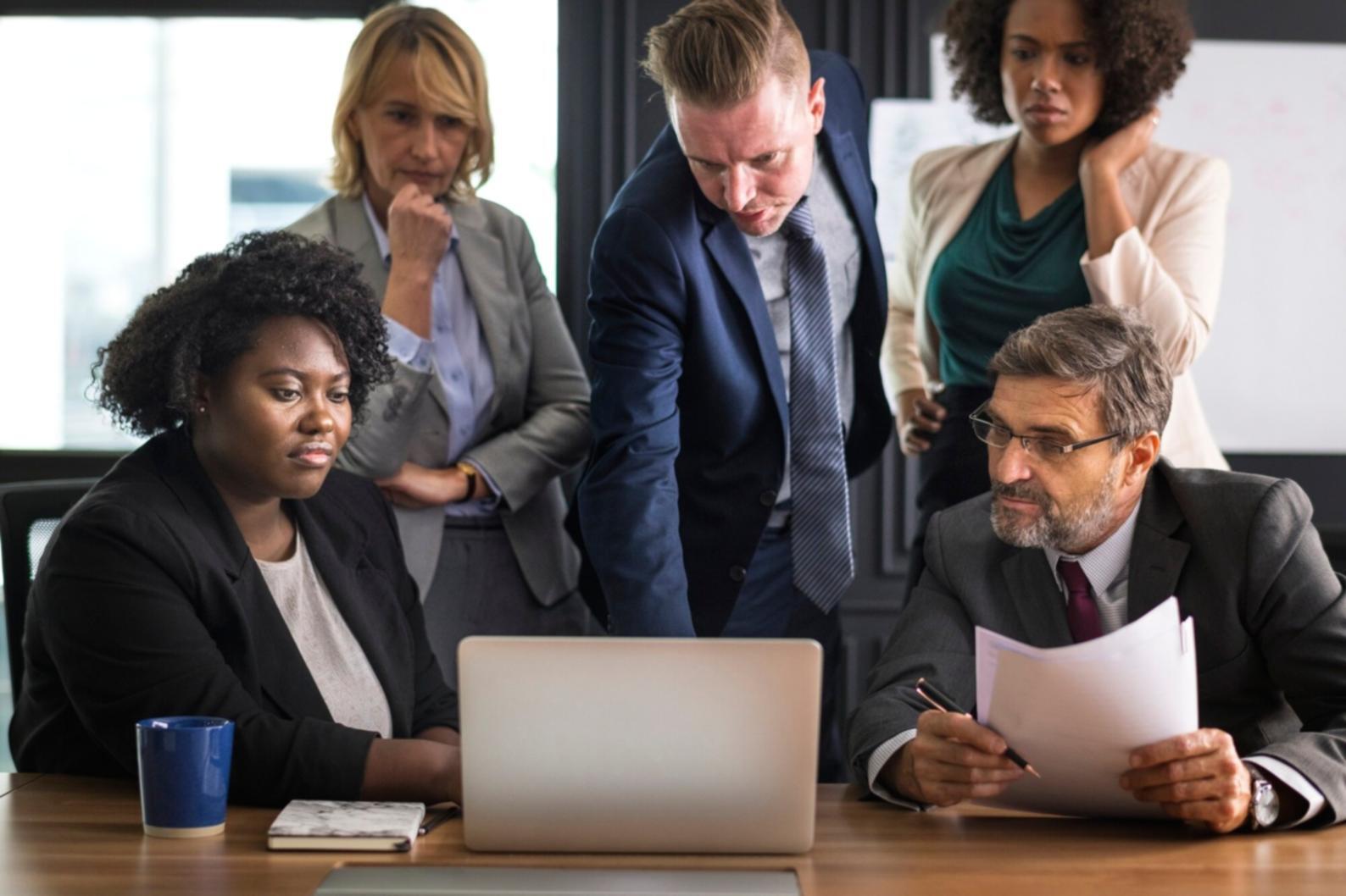 Business meeting discussing financial reports